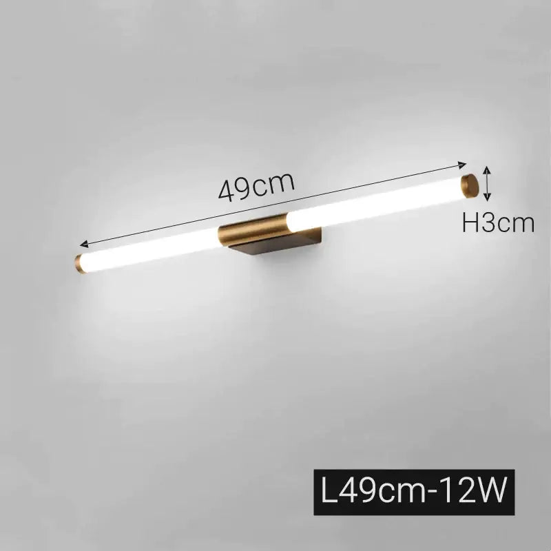 Modern bronze led mirror front wall lamp with sleek white cylindrical tube and brushed brass decorbites bronze led accents