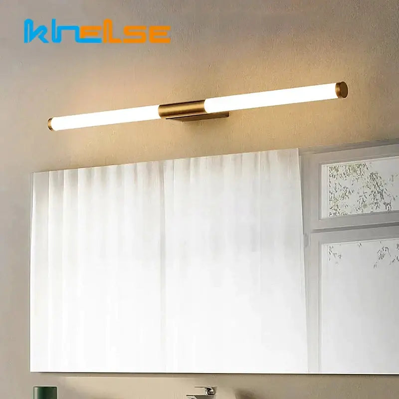 Modern bronze led mirror front wall lamp with gold-toned cylindrical led tubes and brushed metal accents by decorbites bronze led