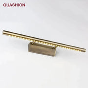 Modern bronze led mirror light fixture in brass finish with sleek cylindrical design and warm white leds for bathroom decorbites bronze led