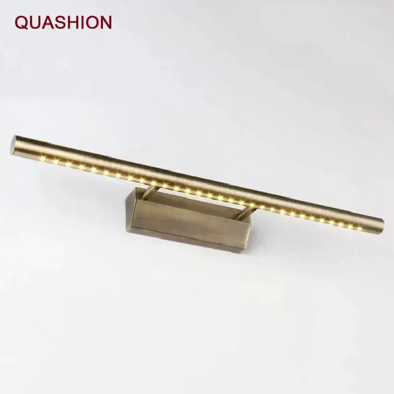 Modern bronze led mirror light fixture in brass finish with sleek cylindrical design and warm white leds for bathroom decorbites bronze led
