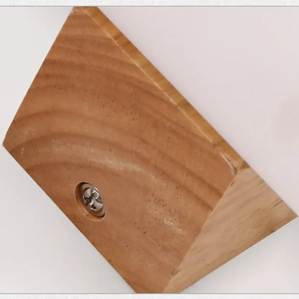 Light brown wooden triangular block with metallic screw, part of modern bronze led wooden wall sconce bedroom lamp decorbites led wooden wall