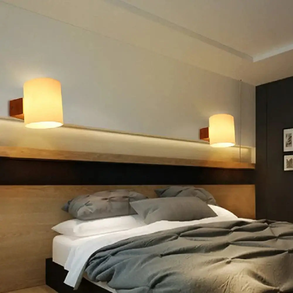 Modern bronze led wooden wall sconce with warm-toned cylindrical frosted glass and wooden fixtures for bedroom decorbites led wooden wall decor
