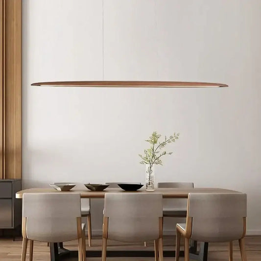 Modern bronze linear pendant light with sleek oval shape and adjustable hanging wire length for dining room use