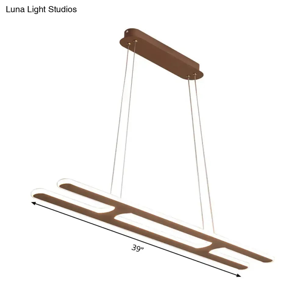 Modern bronze rectangular pendant light with sleek design, three illuminated channels, bulb included, white light