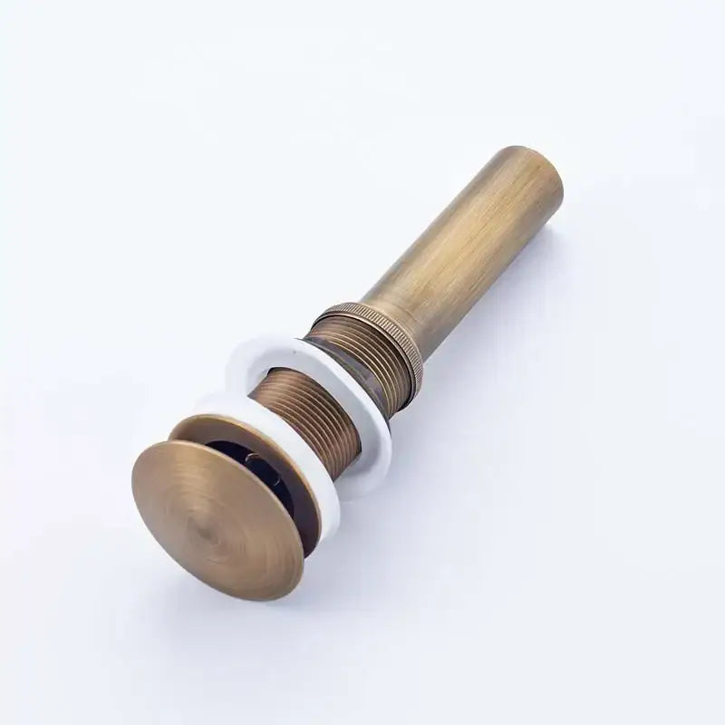Modern bronze round siphon bottle trap bathroom sink drain pipe with antique brass drain and white ceramic flange