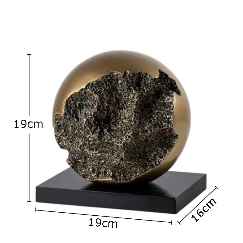 Modern bronze sphere sculpture desk ornament with textured dark interior on black base for living room decorbites decor