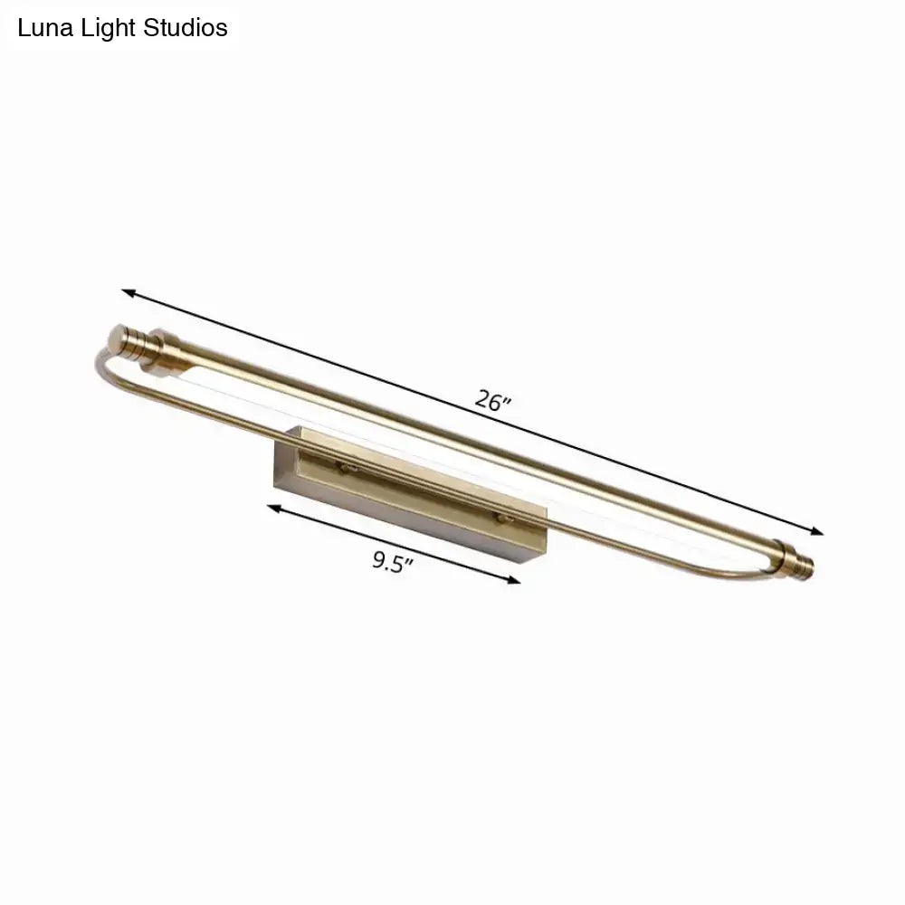 A sleek 26-inch brass-finished modern tubed vanity light with integrated LED warm white lighting for bathroom use