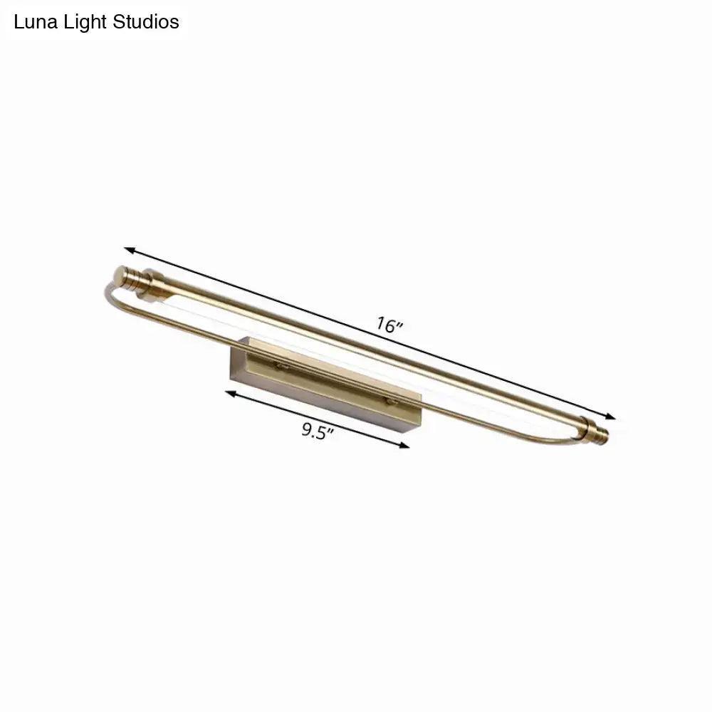 A sleek 16-inch brass finished tubed vanity light fixture with integrated led strip providing warm white lighting