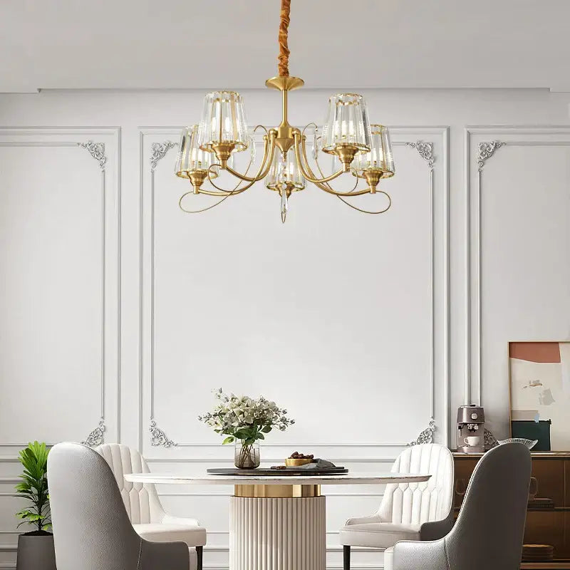 Bronze villa modern light luxury copper chandelier with gold-toned frame clear glass shades and crystal accents hanging from rope