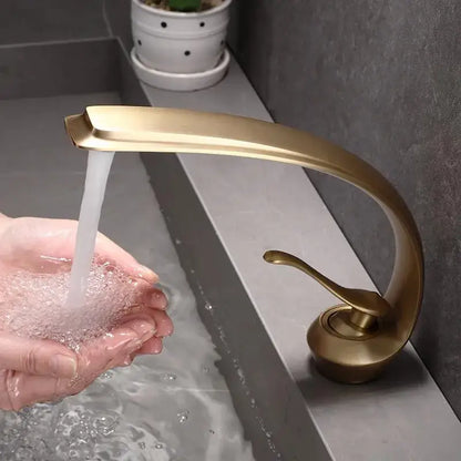 Brass-finished decorbites bronze waterfall bathroom faucet with sleek curved design for hot and cold basin use