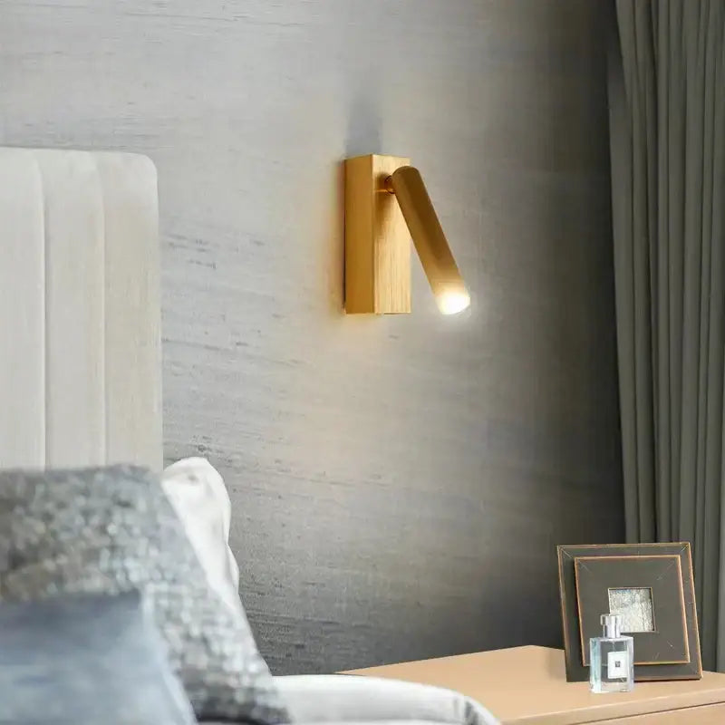 Modern bronze wooden led wall light with adjustable arm and warm golden finish for bedroom reading decorbites led wall light