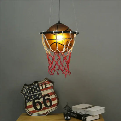Modern brown basketball pendant lights featuring a warm glowing vintage orange ball and red netting for kids room decorbites basketball pendant