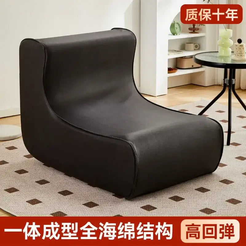 Modern brown and black internet celebrity lazy sofa with black leather-like material and high-resilience foam decorbites internet celebrity
