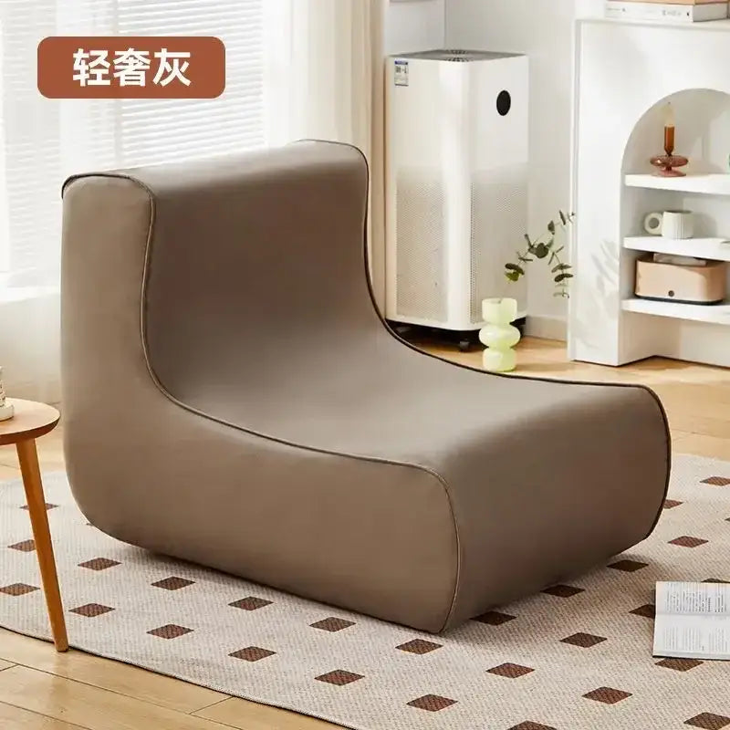 Light gray upholstered lounge chair with soft rounded contours for decorbites internet celebrity lazy sofa living room