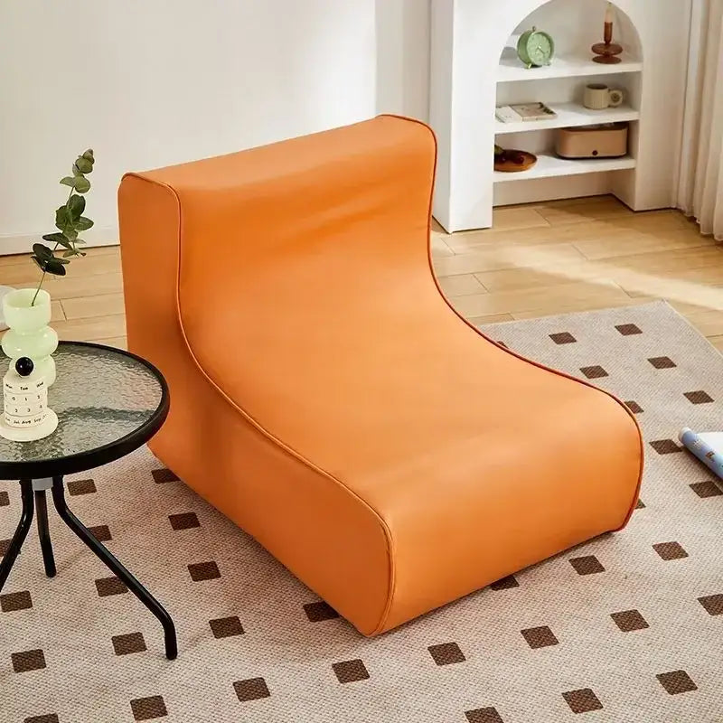 Vibrant orange upholstered internet celebrity lazy sofa with sleek modern design and soft padded contours for decorbites