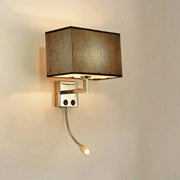 Modern brown and chrome bedroom spotlight wall lamp with rectangular fabric shade and adjustable reading wall light