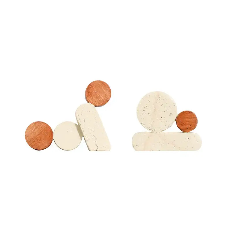Modern brown and cream geometric circle resin handicrafts bookends featuring smooth matte wood and off-white stone decorbites geometric circle