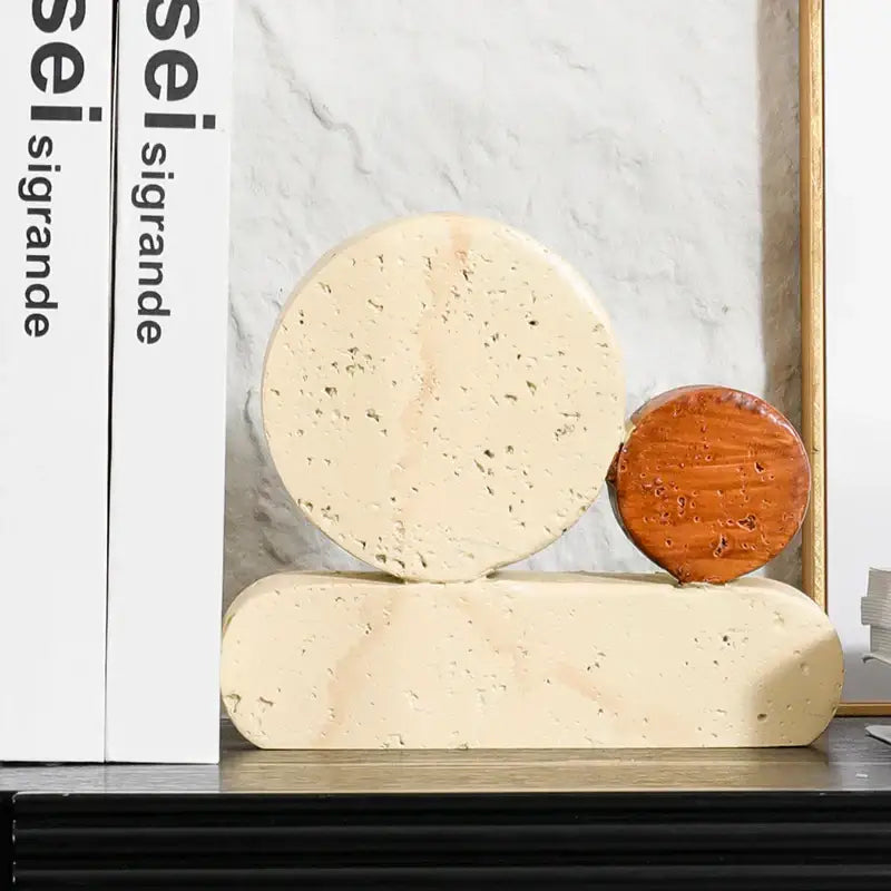 Cream-colored textured stone bookends with geometric circle resin design for living room decorbites handicrafts