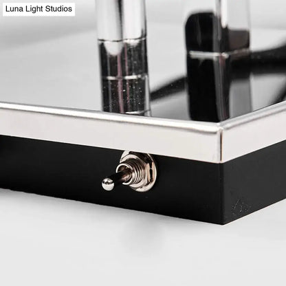 Black and silver metallic desk lamp base with toggle switch for modern brown fabric and chrome wall light bedroom sconce