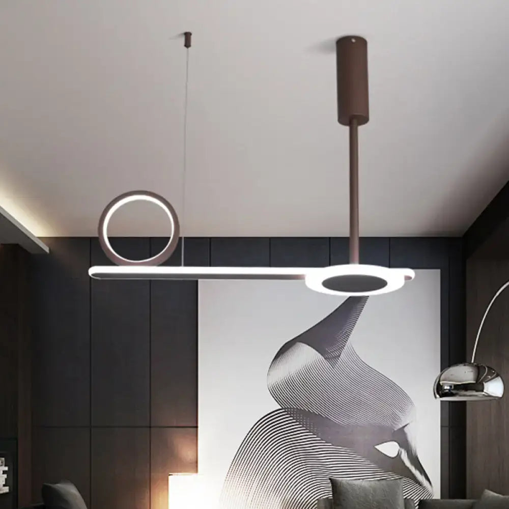 Modern brown metal ring hanging light with cylindrical stem and two glowing led rings for bedroom use