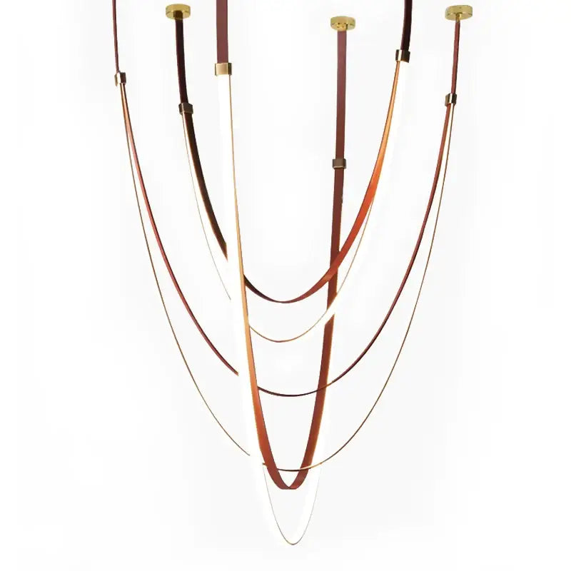 A decorbites designer belt featuring multi-layered brown and tan leather bands with gold-toned metal fittings