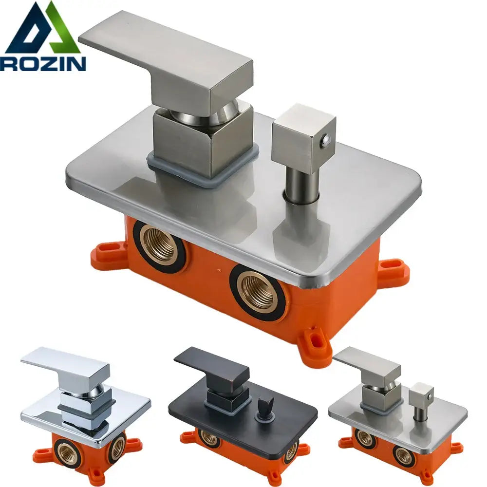 Modern brushed brass and orange shower mixer valve with square handle and stainless steel spout on orange base with brass connectors
