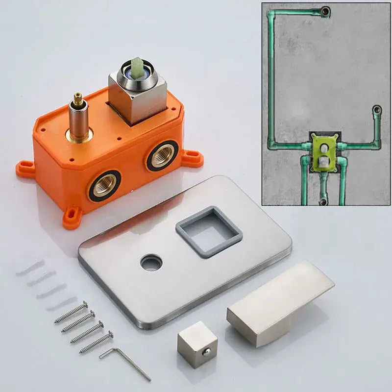 Back view of orange plastic faucet valve assembly with metallic parts for modern brushed brass shower mixer valve