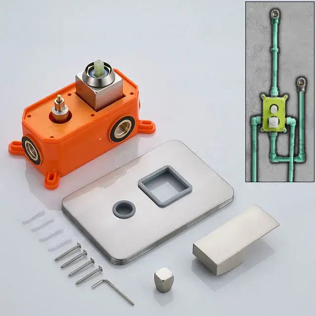 Modern brushed brass and orange wall-mounted shower mixer valve with plastic housing and stainless steel faceplate