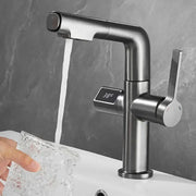 Modern brushed brass basin faucet with digital temperature display showing 38°c for precise bathroom use