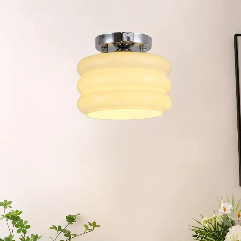 Modern brushed brass creamy glass iron ceiling light with cream-colored ribbed glass and chrome mounting base for bedroom decorbites creamy glass