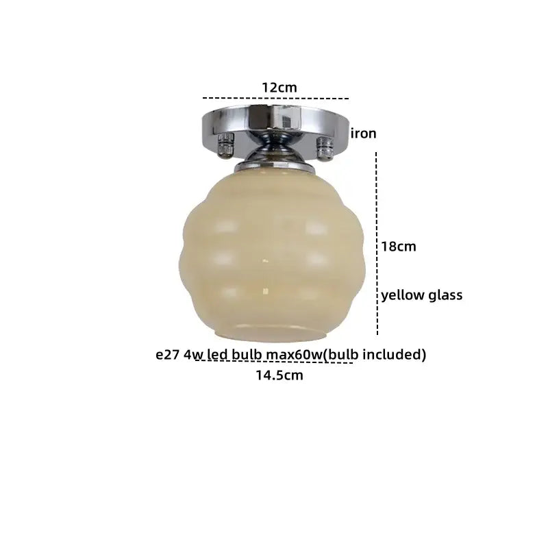 Vintage-style ceiling light with polished chrome iron base and decorbites creamy glass textured yellow globe