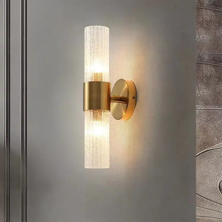 Modern brushed brass crystal wall lamp with gold-toned textured translucent glass cylinder for bedroom decorbites crystal wall lamp