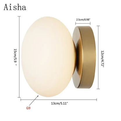 Modern brushed brass wall lamp with frosted opal glass golden glass ball perfect for bedroom decorbites golden glass