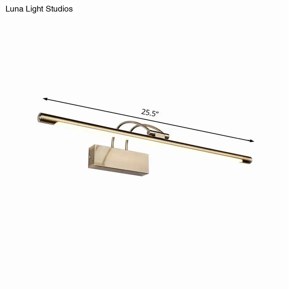 A sleek 25.5 inch modern brushed brass wall light with rectangular housing ideal for bathroom sconce use