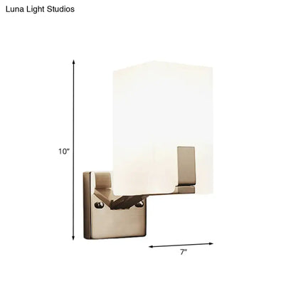 Modern brushed nickel wall sconce with rectangular frosted glass shade light type for bedroom lighting