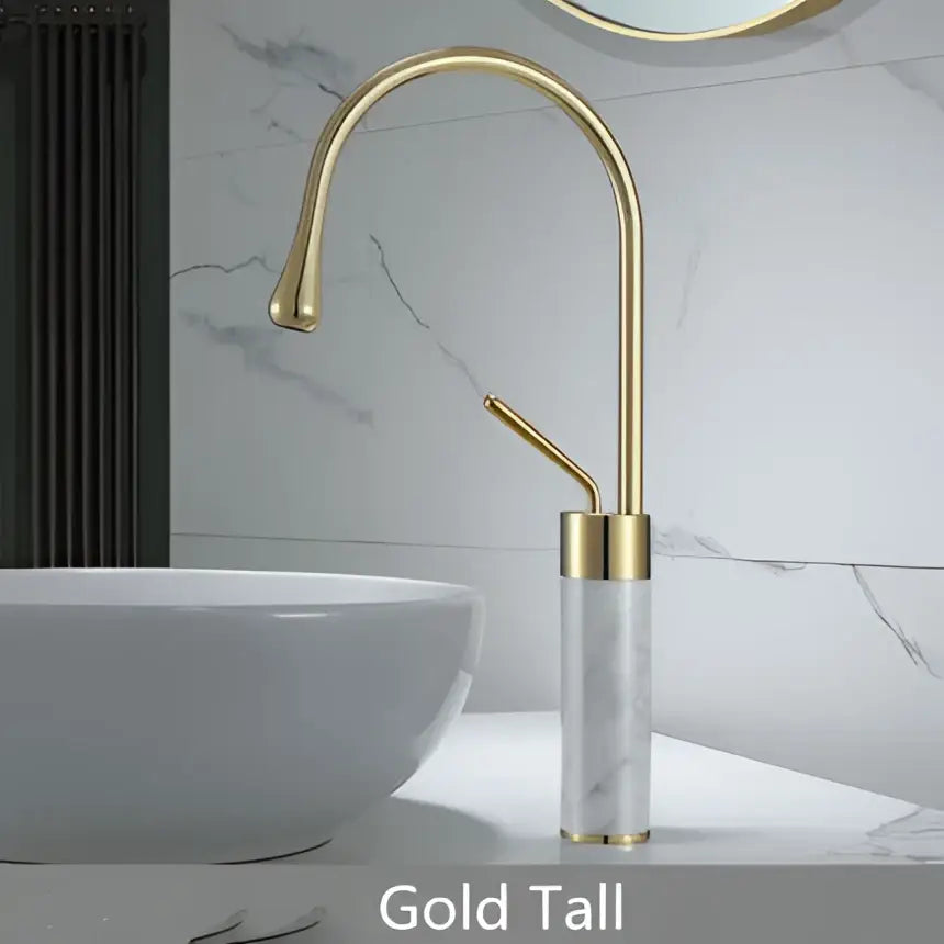 Modern brushed gold bathroom sink faucet with tall gold brass finish and marble pattern cylindrical base