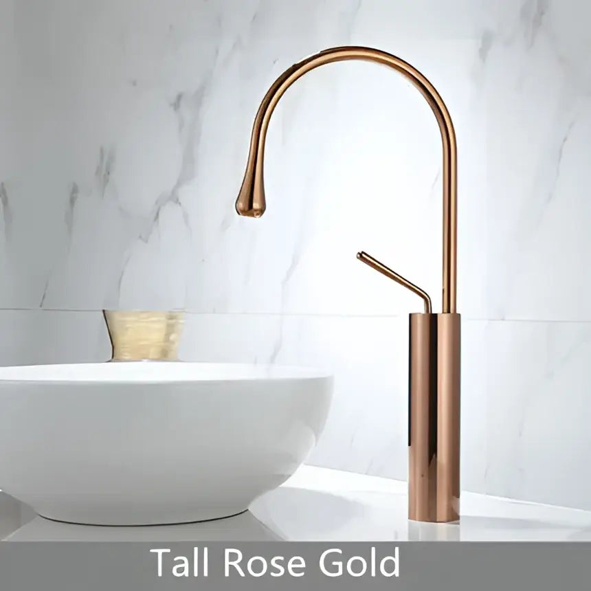 Modern brushed gold brass bathroom sink faucet with tall rose gold brushed gold curved spout and cylindrical base