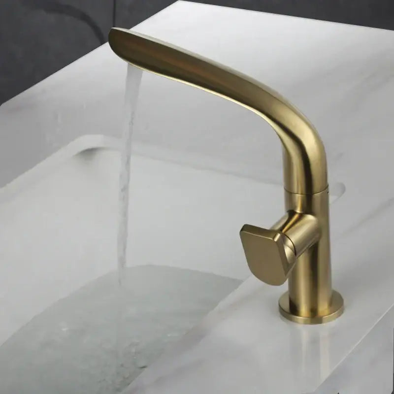 Modern brushed gold basin faucet with single-handle high arc mixer tap featuring sleek curved spout decorbites brushed gold