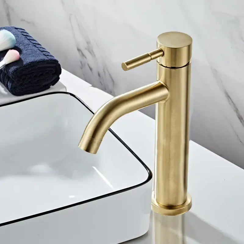 Modern brushed gold basin faucet with single handle mixer tap in sleek minimal design and decorbites brushed gold finish