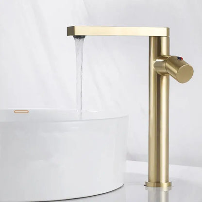 Modern brushed gold basin faucet with a sleek rectangular spout and cylindrical handle by decorbites brushed gold