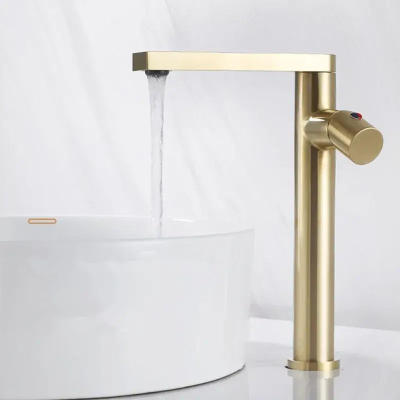 Modern brushed gold basin faucet with a sleek rectangular spout and cylindrical handle by decorbites brushed gold