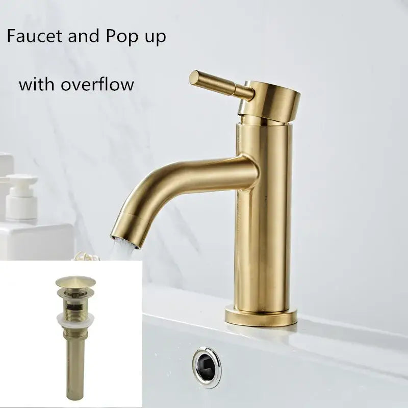 Modern brushed gold basin faucet single handle mixer with pop-up and overflow installed on white sink decorbites brushed gold
