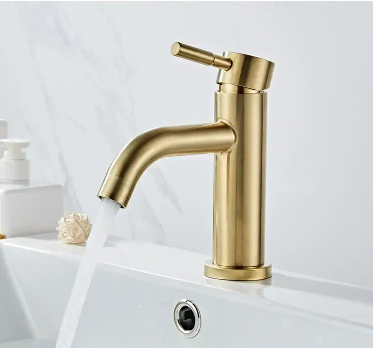 Modern brushed gold basin faucet with single handle mixer featuring a sleek brushed gold decorbites finish