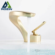 Modern brushed gold basin faucet with sleek curved design and single lever handle by decorbites brushed gold