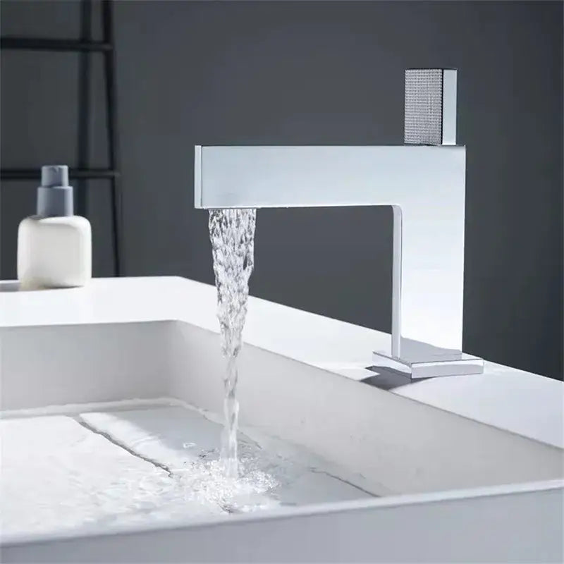 Modern brushed gold basin faucet with sleek rectangular chrome spout and textured square handle decorbites brushed gold