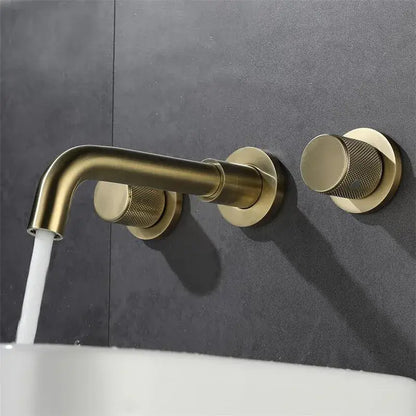 Modern brushed gold basin faucet wall mount with brass finish textured circular knobs and curved spout decorbites brushed gold