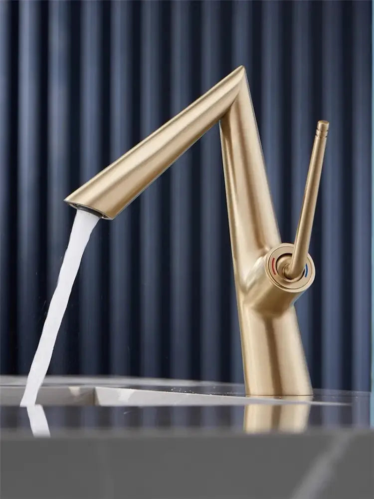 Modern brushed gold basin faucet with sleek angular design and single handle for temperature control by decorbites brushed gold