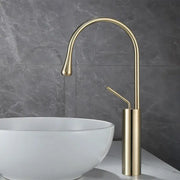 Modern brushed gold basin faucet with sleek curved spout and cylindrical base for kitchen swivel water use decorbites brushed gold