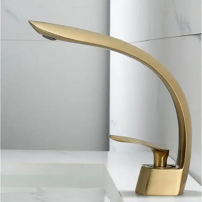 Modern brushed gold basin faucet with sleek curved design and polished metallic finish for bathroom decorbites brushed gold basin