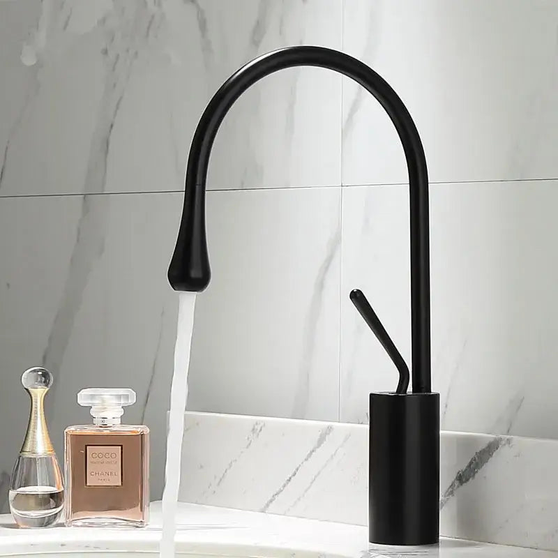 Modern black matte basin faucet with curved spout and cylindrical base for decorbites brushed gold bathroom decor